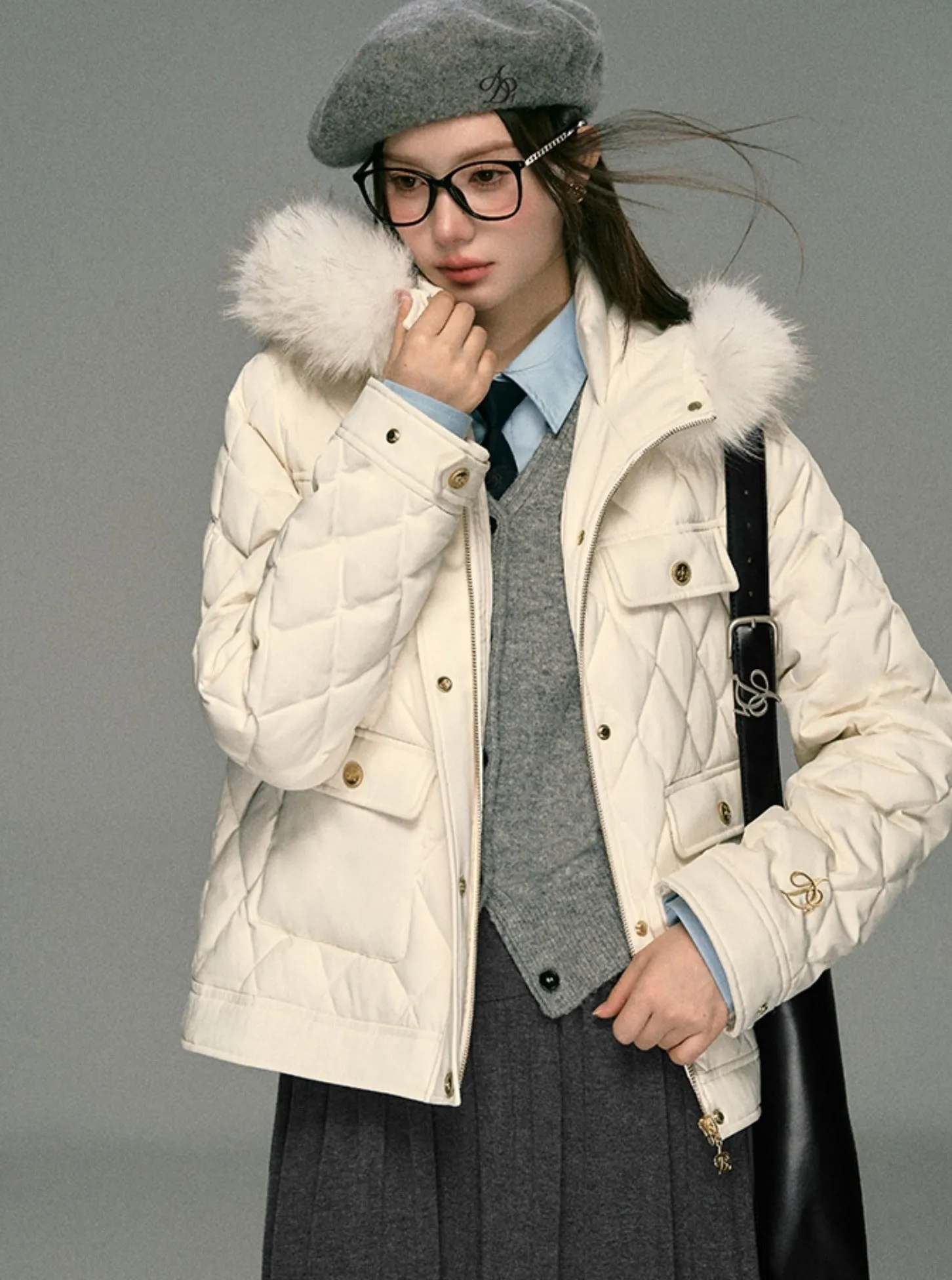 Luxe Quilted Puffer Jacket: Winter White with Faux Fur Hood Trim and Gold Logo Detail